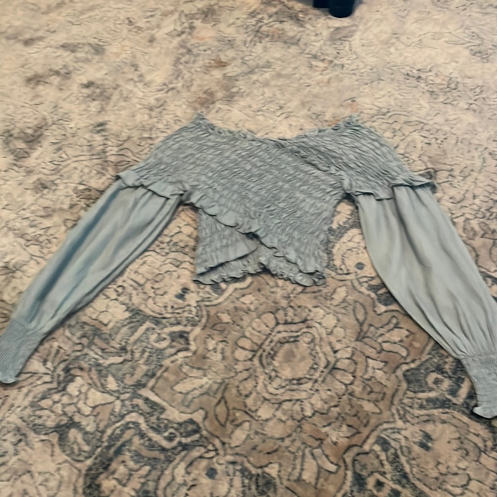 This is a crop blouse.